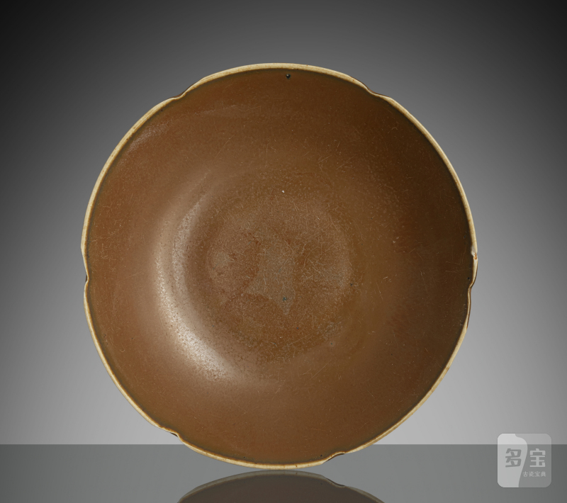 A fine persimmon-glazed 'ding' ware dish